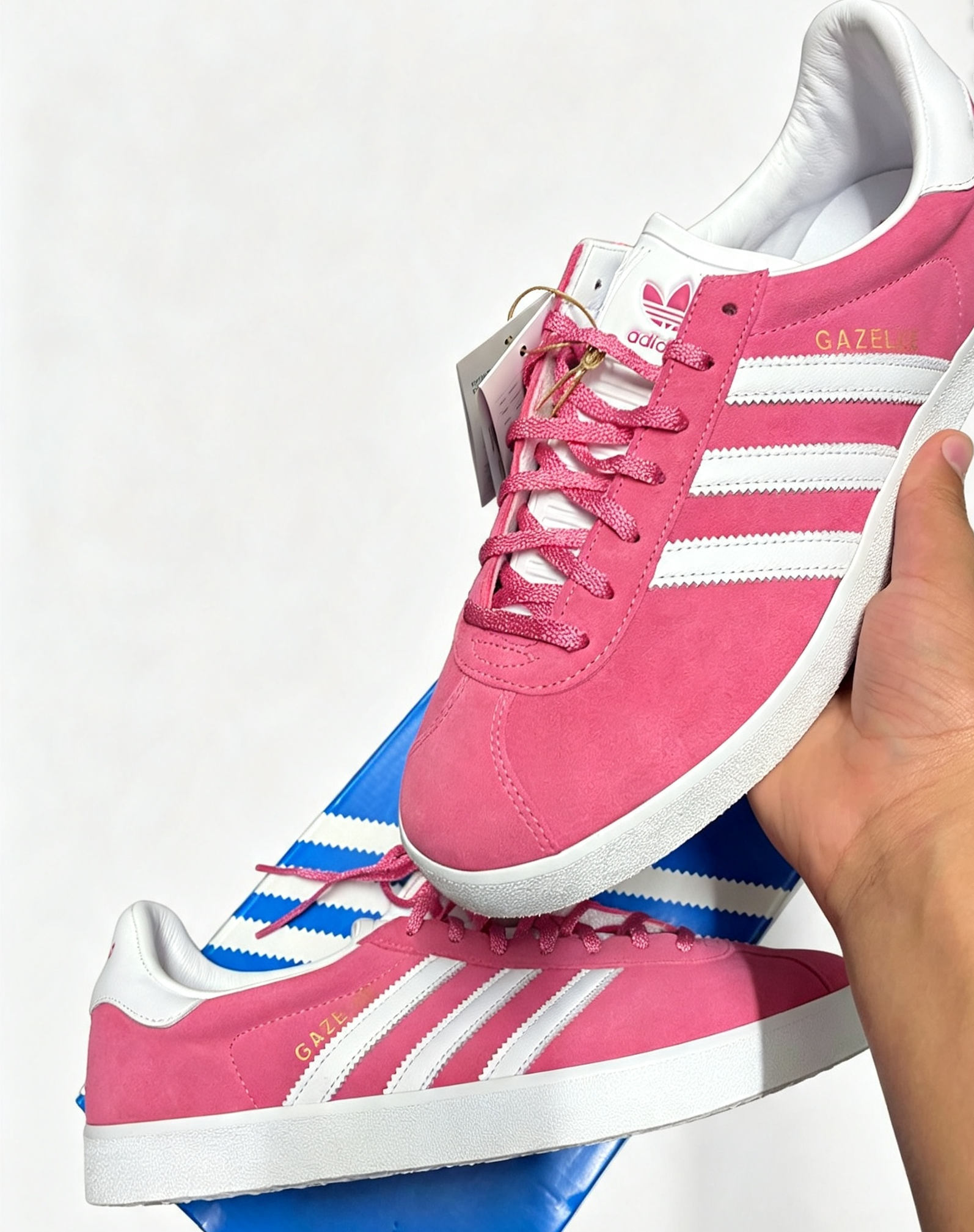 person holding Pink Adidas Gazelle 85's Girls Sneakers Shoes